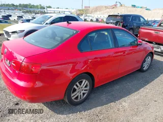 2014 Volkswagen Jetta SE z VIN 3VWD17AJ4EM284216, wystawiony jako IAAI lot #42803481 z przebiegiem 159 177 mil mil oraz . Historia ofert i sprzedaży dostępna na DreamBid. Obrazek 4.
