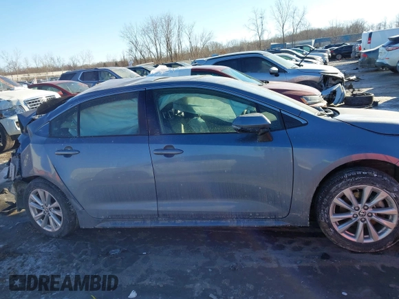2023 Toyota Corolla Hybrid LE with VIN JTDBCMFE2P3007258, listed as a IAAI auction lot 41416080 with 12,517 mi miles. Bid and sale history available at carsss.com. Image 13.