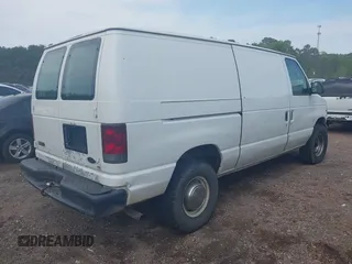 2001 Ford Econoline Cargo with VIN 1FTNE24LX1HB17529, listed as a IAAI auction lot 42002967 with 309,605 mi miles and . Bid and sale history available at DreamBid. Image 4.