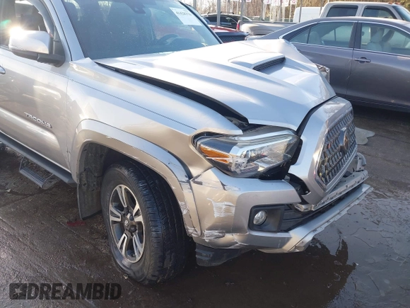 2018 Toyota Tacoma SR with VIN 5TFCZ5AN3JX151479, listed as a IAAI auction lot 41428376 with 104,717 mi miles. Bid and sale history available at carsss.com. Image 18.
