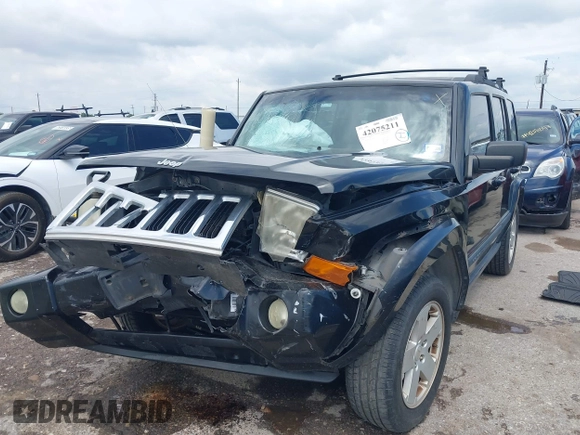 2008 Jeep Commander Sport with VIN 1J8HH48KX8C167462, listed as a IAAI auction lot 42075211 with 183,981 mi miles and . Bid and sale history available at DreamBid. Image 17.