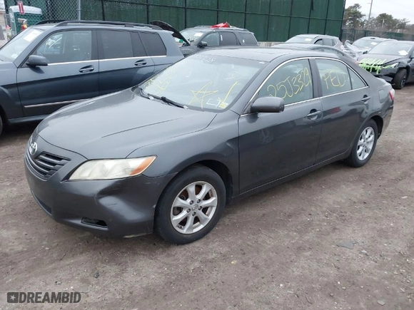 2007 Toyota Camry CE with VIN 4T1BE46K37U669145, listed as a IAAI auction lot 41927728 with 999,999 mi miles. Bid and sale history available at carsss.com. Image 2.