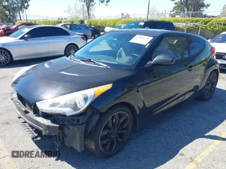 2013 Hyundai Veloster w/Black Int z VIN KMHTC6AD7DU173310, wystawiony jako IAAI lot #41881799 z przebiegiem 147 034 mil mil oraz . Historia ofert i sprzedaży dostępna na DreamBid. Obrazek 18.