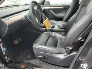 2023 Tesla Model Y Long Range z VIN 7SAYGDEE7PF965446, wystawiony jako Copart lot #54710375 z przebiegiem 23 807 mil mil oraz Szkoda całkowita • Salvage title. Historia ofert i sprzedaży dostępna na DreamBid. Obrazek 7.