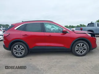 2021 Ford Escape SEL z VIN 1FMCU9H61MUA64735, wystawiony jako IAAI lot #42511030 z przebiegiem 85 707 mil mil oraz . Historia ofert i sprzedaży dostępna na DreamBid. Obrazek 14.