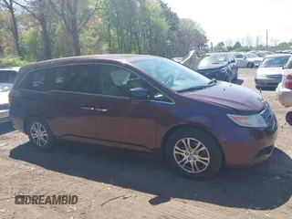 2011 Honda Odyssey EX-L with VIN 5FNRL5H69BB093996, listed as a IAAI auction lot 42151381 with 88,531 mi miles and . Bid and sale history available at carsss.com. Image 13.