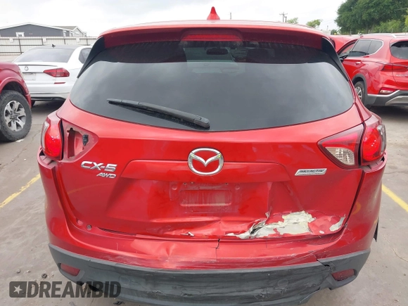 2015 Mazda CX-5 Touring with VIN JM3KE4CYXF0439953, listed as a IAAI auction lot 42124197 with 242,614 mi miles and . Bid and sale history available at DreamBid. Image 16.