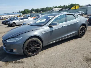 2013 Tesla Model S Performance with VIN 5YJSA1CP5DFP05260, listed as a Copart auction lot 62391945 with Not provided miles and Clean title. Bid and sale history available at DreamBid. Image 1.