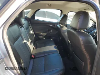 2014 Ford Focus Titanium z VIN 1FADP3N2XEL263357, wystawiony jako Copart lot #84610634 z przebiegiem 142 023 mil mil oraz Nie do naprawy • Non repairable. Historia ofert i sprzedaży dostępna na DreamBid. Obrazek 11.
