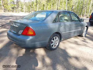2002 Toyota Avalon XL with VIN 4T1BF28B42U257954, listed as a IAAI auction lot 42050833 with 367,984 mi miles. Bid and sale history available at carsss.com. Image 4.