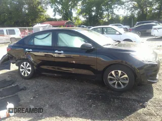 2023 Kia Rio S with VIN 3KPA24AD5PE531705, listed as a IAAI auction lot 39817112 with 73,997 mi miles. Bid and sale history available at carsss.com. Image 13.