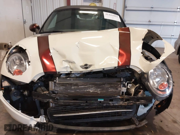 2013 MINI Roadster with VIN WMWSY1C52DT625564, listed as a IAAI auction lot 41442864 with 98,240 mi miles and . Bid and sale history available at DreamBid. Image 13.