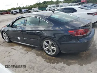 2014 Volkswagen CC R-Line with VIN WVWAN7AN5EE534548, listed as a Copart auction lot 61730364 with 104,545 mi miles and Salvage Title. Bid and sale history available at carsss.com. Image 2.