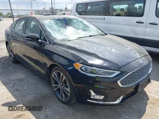 2020 Ford Fusion Titanium with VIN 3FA6P0D99LR203347, listed as a IAAI auction lot 42038291 with 98,434 mi miles and . Bid and sale history available at DreamBid. Image 1.