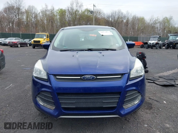 2015 Ford Escape SE with VIN 1FMCU9GX4FUC73125, listed as a IAAI auction lot 42071815 with 71,681 mi miles. Bid and sale history available at carsss.com. Image 12.