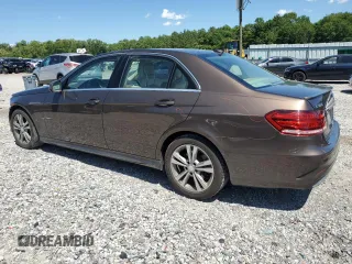 2014 Mercedes-Benz E 350 Luxury with VIN WDDHF8JB5EB004904, listed as a Copart auction lot 56923425 with 135,459 mi miles and Salvage title. Bid and sale history available at DreamBid. Image 2.