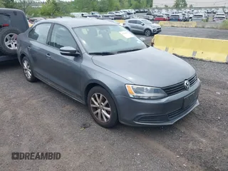2012 Volkswagen Jetta SE with VIN 3VWDP7AJ4CM401496, listed as a IAAI auction lot 42786070 with 146,969 mi miles and . Bid and sale history available at DreamBid. Image 1.