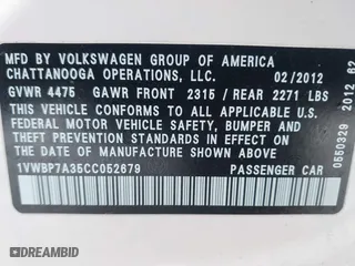 2012 Volkswagen Passat SE with VIN 1VWBP7A35CC052679, listed as a IAAI auction lot 41268199 with 125,691 mi miles. Bid and sale history available at carsss.com. Image 9.