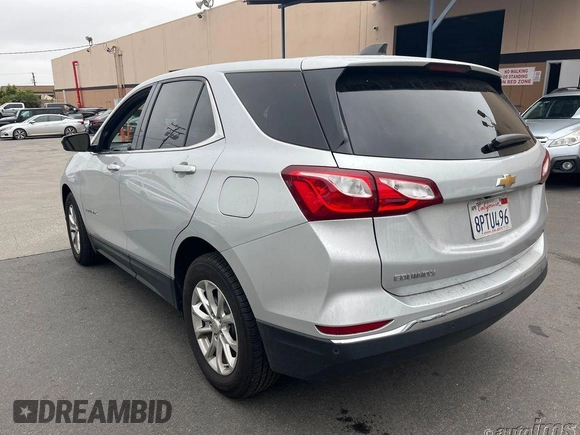 2020 Chevrolet Equinox LT z VIN 2GNAXJEV5L6232137, wystawiony jako IAAI lot #42564889 z przebiegiem 72 940 mil mil oraz . Historia ofert i sprzedaży dostępna na DreamBid. Obrazek 5.