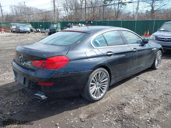 2013 BMW 6 Series 650i xDrive with VIN WBA6B4C53DD098536, listed as a IAAI auction lot 41825107 with 999,999 mi miles. Bid and sale history available at carsss.com. Image 4.