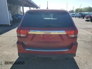 2011 Jeep Grand Cherokee Overland with VIN 1J4RR6GT8BC606688, listed as a Copart auction lot 57182295 with 100,423 mi miles and Salvage title. Bid and sale history available at DreamBid. Image 6.