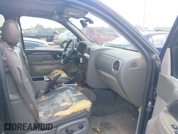 2004 GMC Envoy SLE with VIN 1GKDS13SX42398363, listed as a IAAI auction lot 42154134 with 308,001 mi miles and . Bid and sale history available at DreamBid. Image 5.