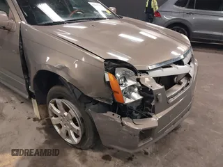 2007 Cadillac SRX with VIN 1GYEE637370137893, listed as a IAAI auction lot 41869395 with 215,460 mi miles. Bid and sale history available at carsss.com. Image 6.