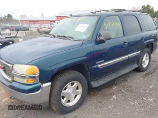 2005 GMC Yukon SLT with VIN 1GKEK13T15R196436, listed as a IAAI auction lot 41952646 with 247,487 mi miles. Bid and sale history available at carsss.com. Image 2.