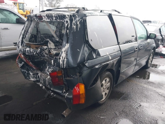 2004 Honda Odyssey EX-L with VIN 5FNRL18974B015769, listed as a IAAI auction lot 41533063 with 284,923 mi miles and . Bid and sale history available at DreamBid. Image 4.
