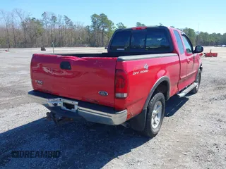 2003 Ford F-150 XL with VIN 2FTRX18L13CA49907, listed as a IAAI auction lot 41781349 with 132,944 mi miles. Bid and sale history available at carsss.com. Image 4.