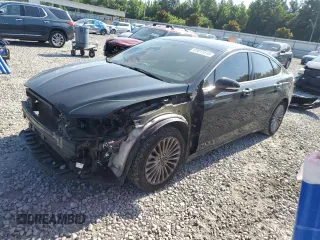 2016 Ford Fusion Titanium z VIN 3FA6P0K93GR346772, wystawiony jako Copart lot #61611515 z przebiegiem 169 502 mil mil oraz Szkoda całkowita • Salvage title. Historia ofert i sprzedaży dostępna na DreamBid. Obrazek 1.