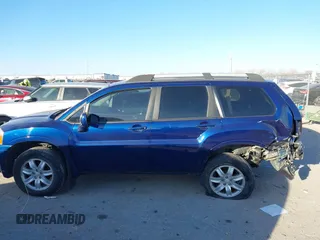 2010 Mitsubishi Endeavor LS with VIN 4A4JN2AS9AE002389, listed as a IAAI auction lot 41390321 with 103,060 mi miles. Bid and sale history available at carsss.com. Image 14.
