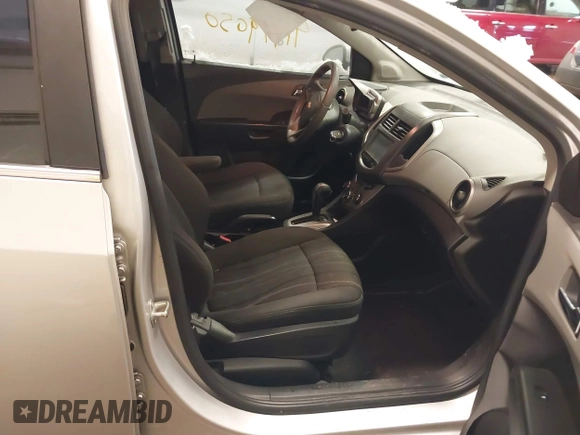 2014 Chevrolet Sonic LT with VIN 1G1JC6SB5E4234334, listed as a IAAI auction lot 41719050 with 118,755 mi miles. Bid and sale history available at carsss.com. Image 5.