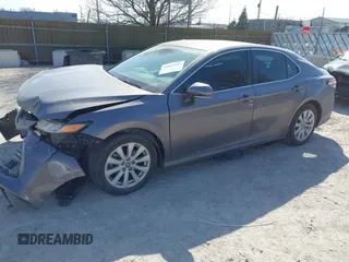 2019 Toyota Camry LE with VIN 4T1B11HK9KU810347, listed as a IAAI auction lot 41804007 with 75,063 mi miles and . Bid and sale history available at DreamBid. Image 23.