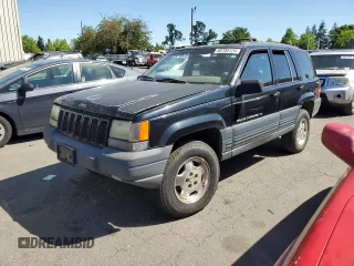 1998 Jeep Grand Cherokee Laredo with VIN 1J4GZ58Y4WC109610, listed as a Copart auction lot 58705124 with 247,990 mi miles and Salvage Title. Bid and sale history available at carsss.com. Image 1.