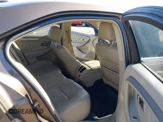 2015 Ford Taurus SEL with VIN 1FAHP2E83FG206055, listed as a IAAI auction lot 41943670 with 90,808 mi miles and . Bid and sale history available at carsss.com. Image 8.