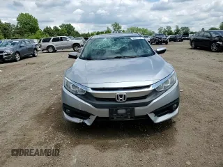 2016 Honda Civic EX-L z VIN 19XFC1F77GE038287, wystawiony jako Copart lot #58937695 z przebiegiem 146 025 mil mil oraz Szkoda całkowita • Salvage title. Historia ofert i sprzedaży dostępna na DreamBid. Obrazek 13.