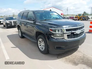 2019 Chevrolet Tahoe LT z VIN 1GNSKBKC6KR266831, wystawiony jako IAAI lot #42174593 z przebiegiem 103 199 mil mil oraz . Historia ofert i sprzedaży dostępna na DreamBid. Obrazek 1.