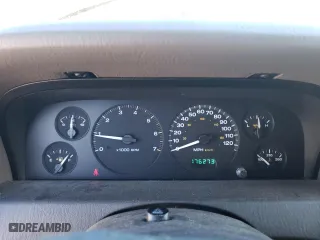 2004 Jeep Grand Cherokee Laredo with VIN 1J4GX48N14C435481, listed as a Copart auction lot 87855975 with 176,273 mi miles and Salvage Title. Bid and sale history available at carsss.com. Image 9.