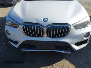 2019 BMW X1 xDrive28i with VIN WBXHT3C57K5L89697, listed as a IAAI auction lot 40729513 with 46,319 mi miles and . Bid and sale history available at DreamBid. Image 6.