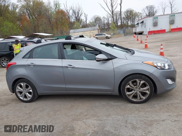 2014 Hyundai Elantra GT with VIN KMHD35LH6EU165019, listed as a IAAI auction lot 42016057 with 121,794 mi miles. Bid and sale history available at carsss.com. Image 13.