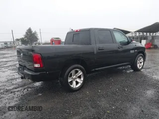 2016 Ram 1500 Sport with VIN 1C6RR6MT7GS241127, listed as a IAAI auction lot 41230712 with 129,586 mi miles. Bid and sale history available at carsss.com. Image 4.