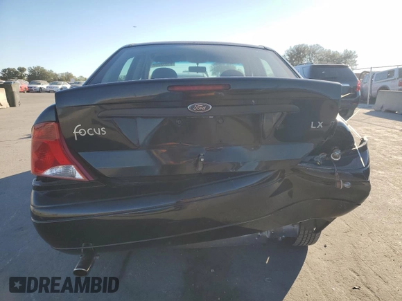 2000 Ford Focus LX with VIN 1FAFP33P8YW216936, listed as a Copart auction lot 83038404 with 120,298 mi miles and Salvage Title. Bid and sale history available at DreamBid. Image 6.