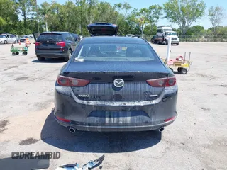 2021 Mazda 3 Select с VIN JM1BPABLXM1326518, выставлен на аукционе IAAI как лот 42130502 с пробегом 82 893 миль миль и . История ставок и продаж доступна на DreamBid. Изображение 16.