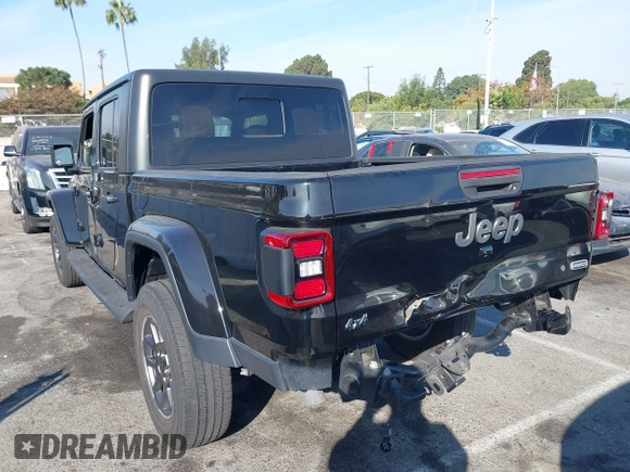 2020 Jeep Gladiator Overland with VIN 1C6HJTFG7LL139980, listed as a IAAI auction lot 40713794 with 33,560 mi miles and . Bid and sale history available at DreamBid. Image 3.