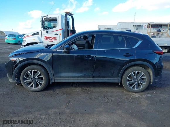 2022 Mazda CX-5 2.5 S Premium Package with VIN JM3KFBDM8N1544898, listed as a IAAI auction lot 41471186 with NaN miles. Bid and sale history available at carsss.com. Image 14.