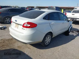 2012 Ford Fiesta SE with VIN 3FADP4BJ0CM207764, listed as a IAAI auction lot 41852699 with 143,287 mi miles. Bid and sale history available at carsss.com. Image 4.