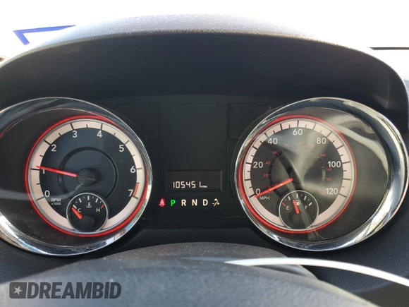 2014 Dodge Grand Caravan SXT with VIN 2C4RDGCG1ER121033, listed as a Copart auction lot 52030715 with 105,451 mi miles and Salvage Title. Bid and sale history available at DreamBid. Image 9.