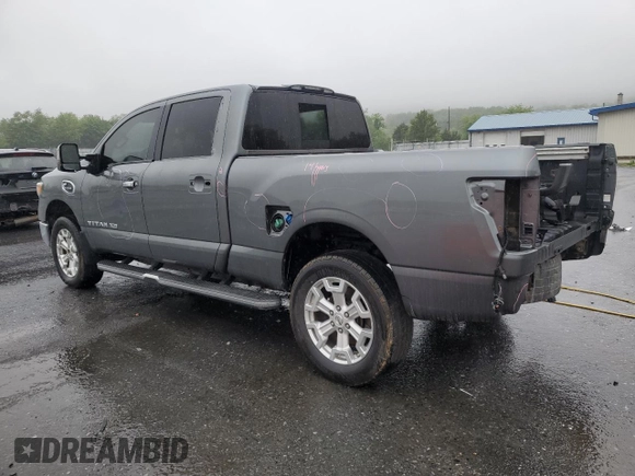 2016 Nissan Titan SL with VIN 1N6BA1F48GN511567, listed as a Copart auction lot 57864775 with 141,545 mi miles and Salvage title. Bid and sale history available at DreamBid. Image 2.