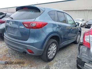 2016 Mazda CX-5 Touring z VIN JM3KE2CY2G0699138, wystawiony jako IAAI lot #42153228 z przebiegiem 144 191 mil mil oraz . Historia ofert i sprzedaży dostępna na DreamBid. Obrazek 4.